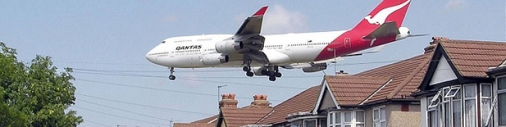 Noisy plane flying low over a house - you might require sound insulation